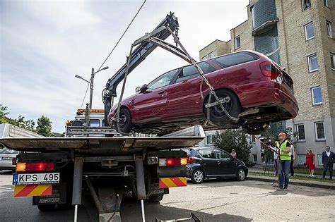 Automobilio statymas neįgaliojo vietoje